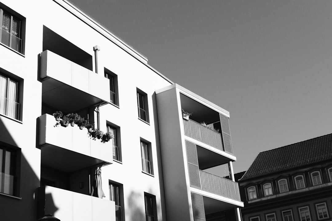 grayscale photo of concrete building,