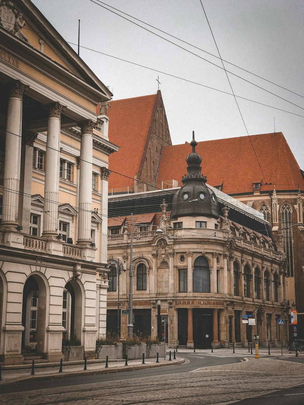 brown and white concrete building during daytime