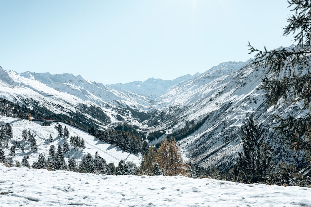 snow covered mountain during daytime