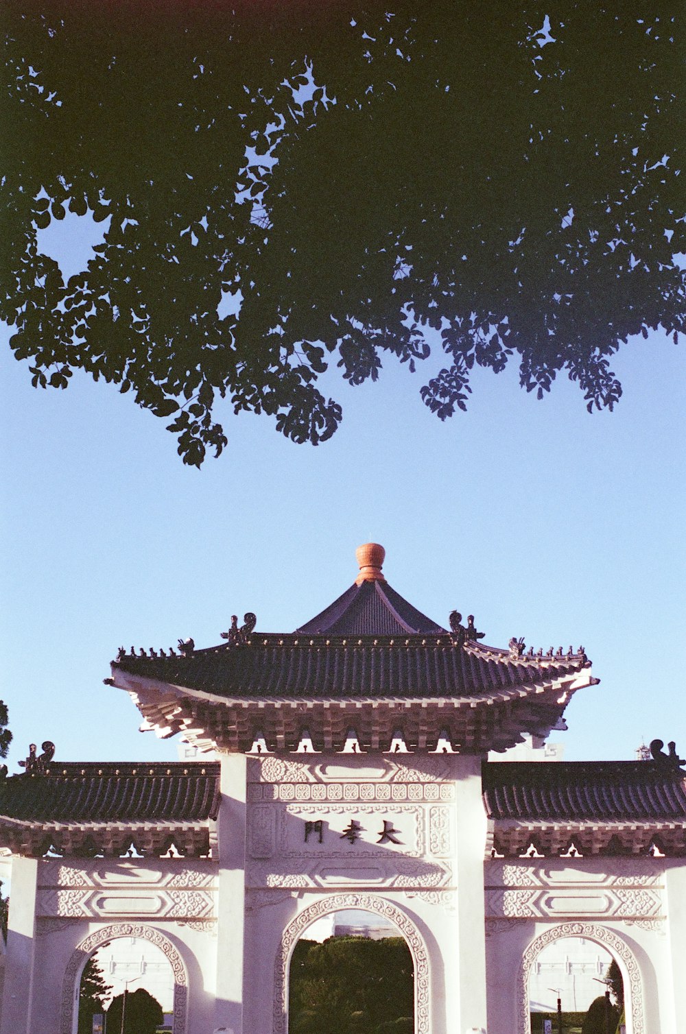 white and brown concrete building under blue sky during daytime