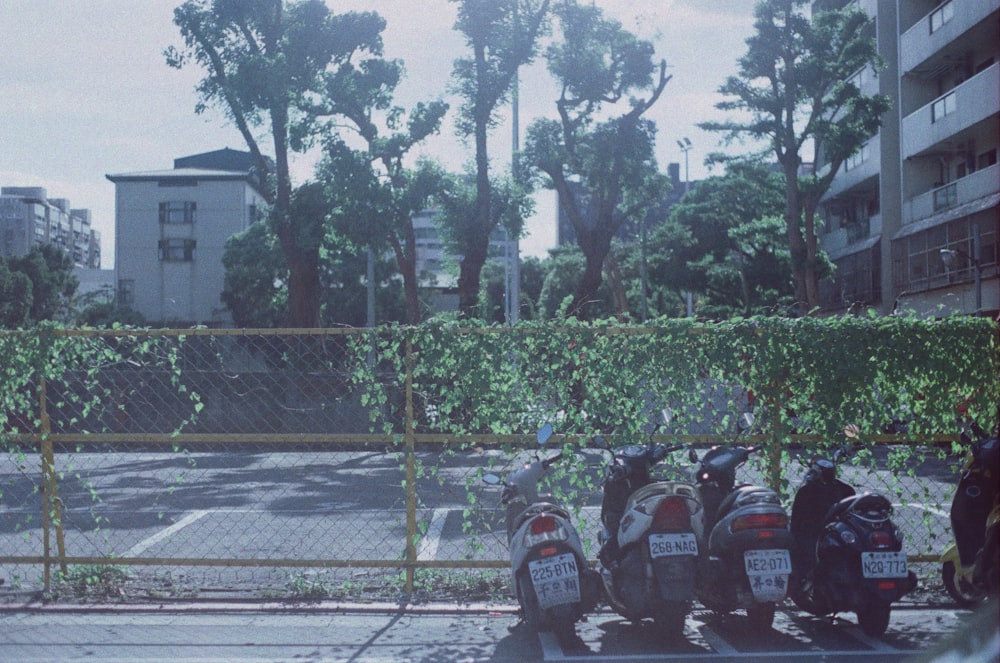 motorcycle parked on parking lot during daytime