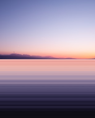 balance and symmetry for photo composition,how to photograph silhouette of mountain during sunset