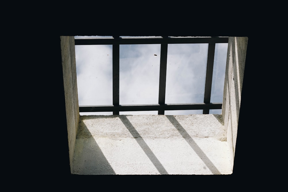 white wooden framed glass window