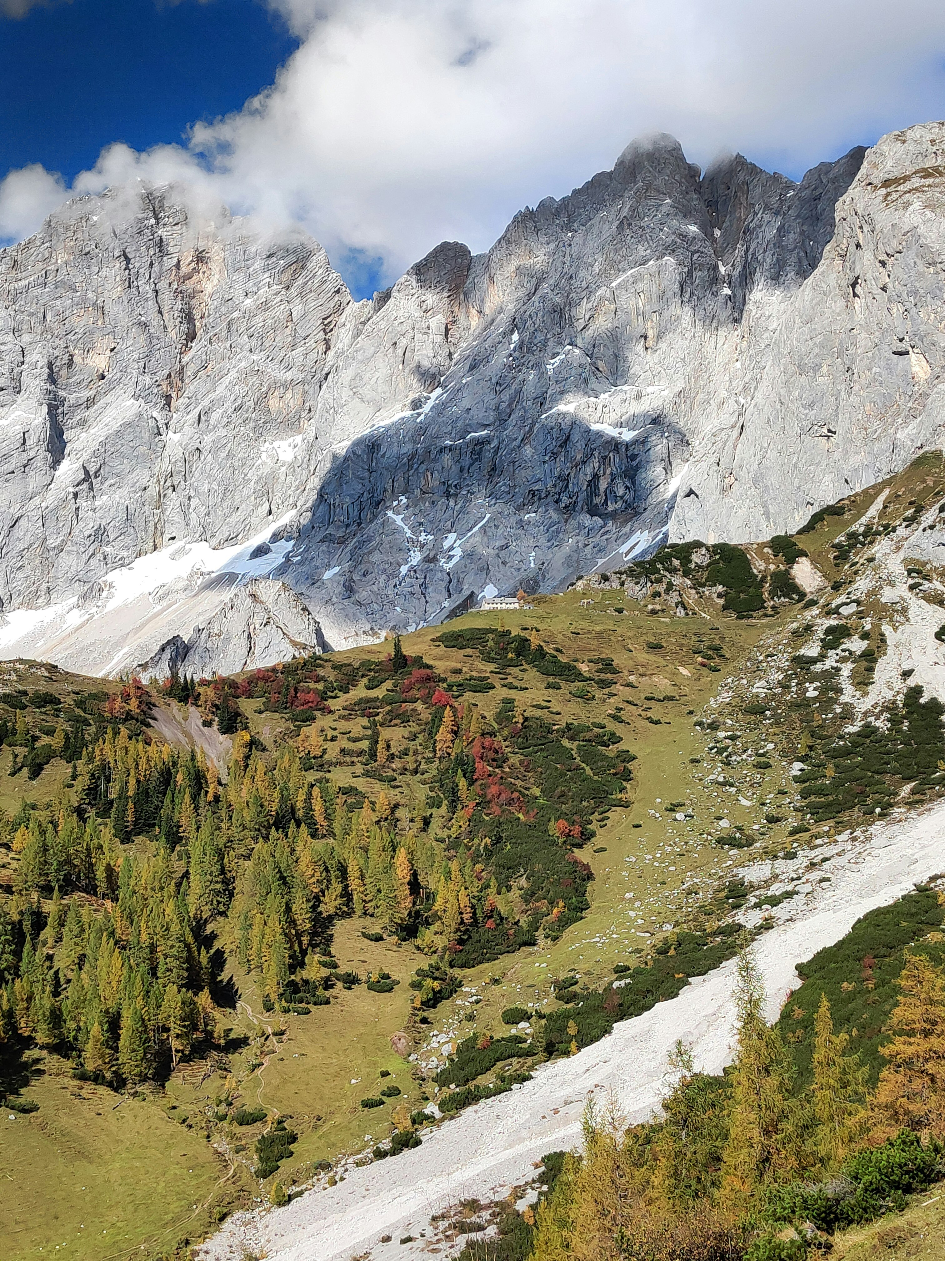 green and white mountains under blue sky during daytime