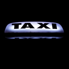 A price list displayed on a taxi company’s promotional flyer.