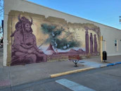 A colorful mural celebrating Native American heritage and cultural symbols.