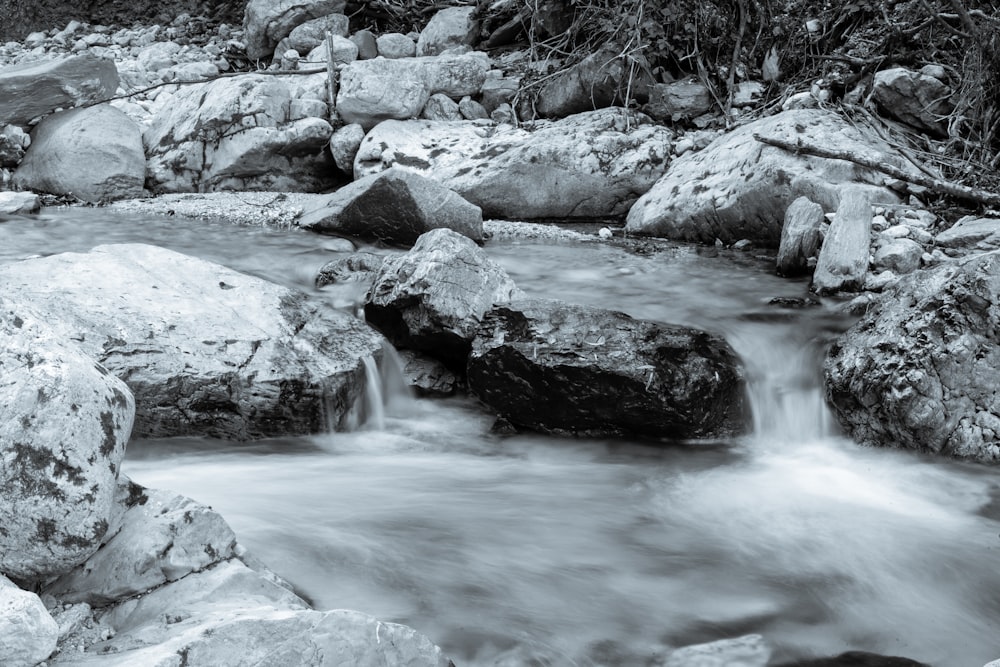 gray rocks on river during daytime