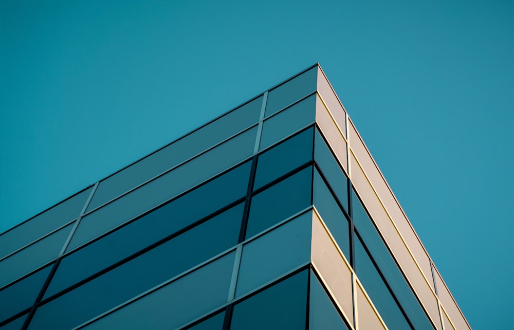 white and black concrete building under blue sky during daytime