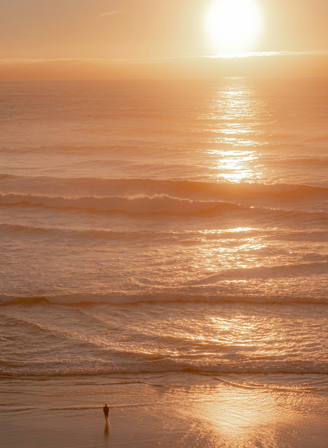 body of water during sunset