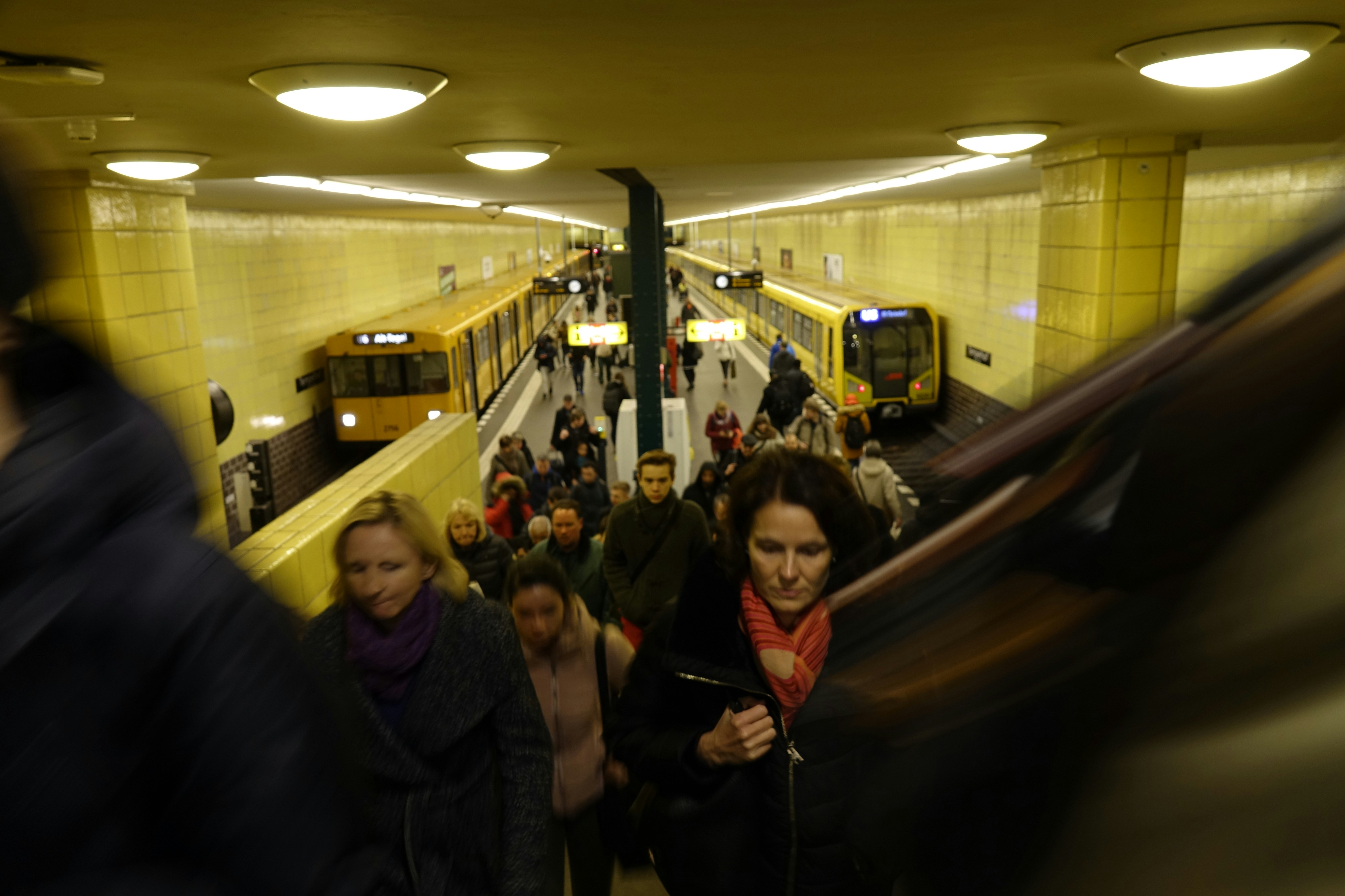 group of people in a train station