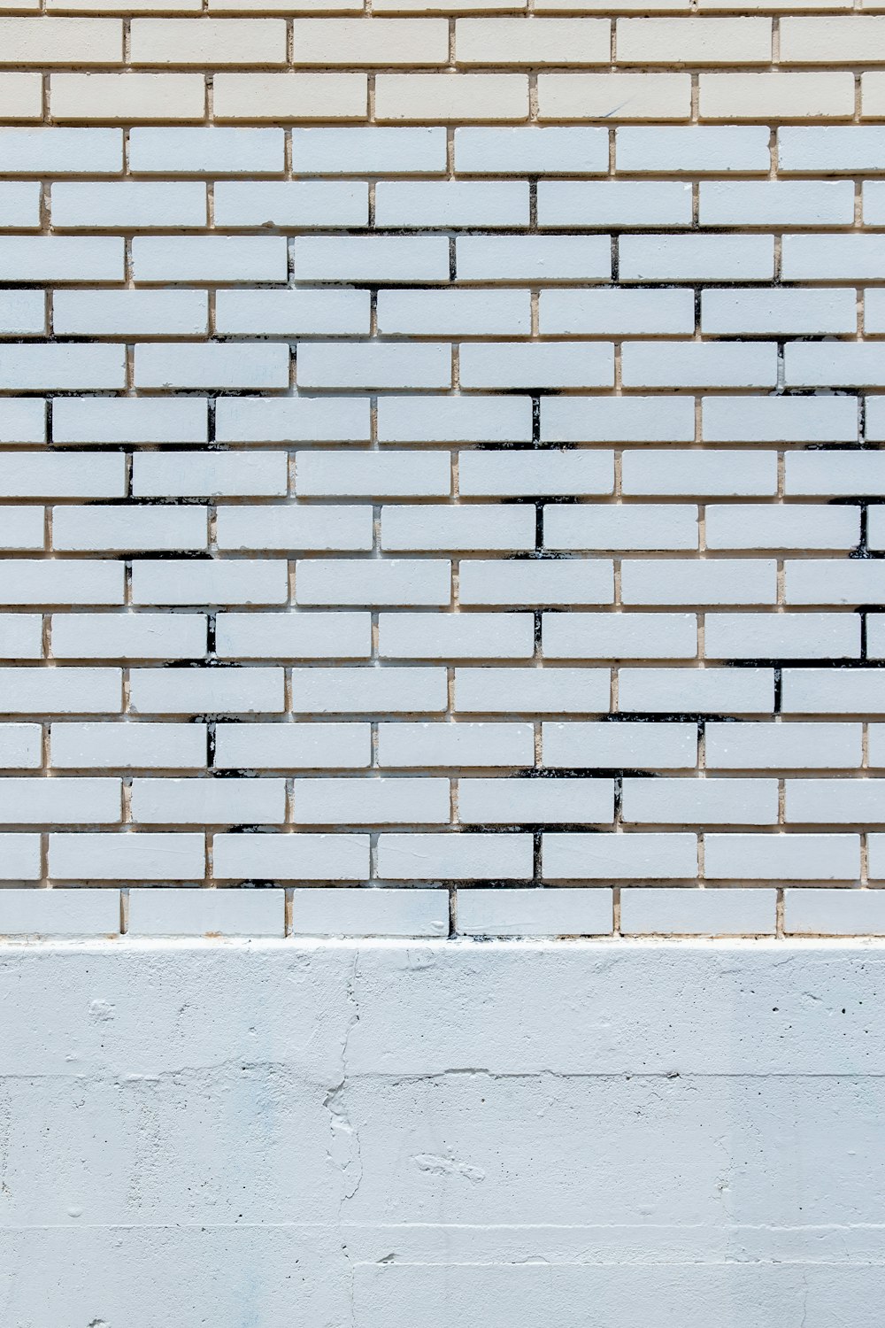 white and brown brick wall