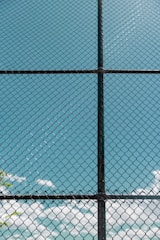 black metal chain link fence