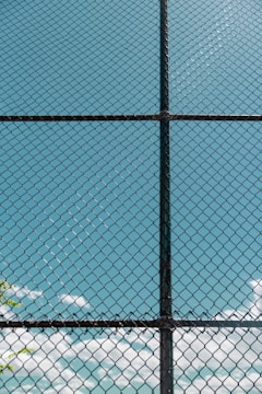 black metal chain link fence