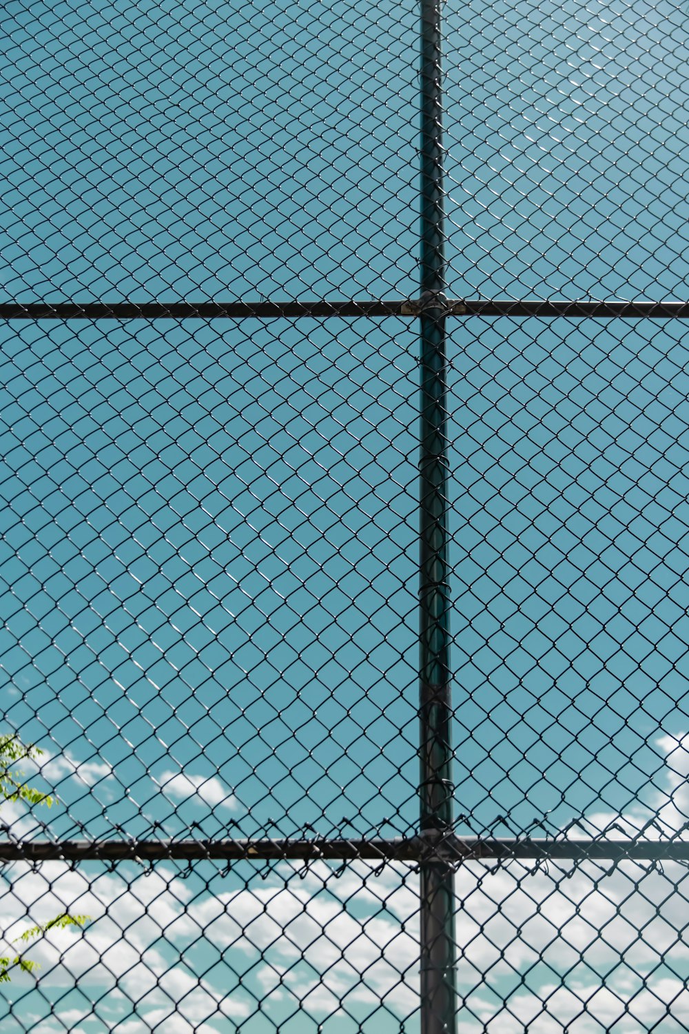 black metal chain link fence