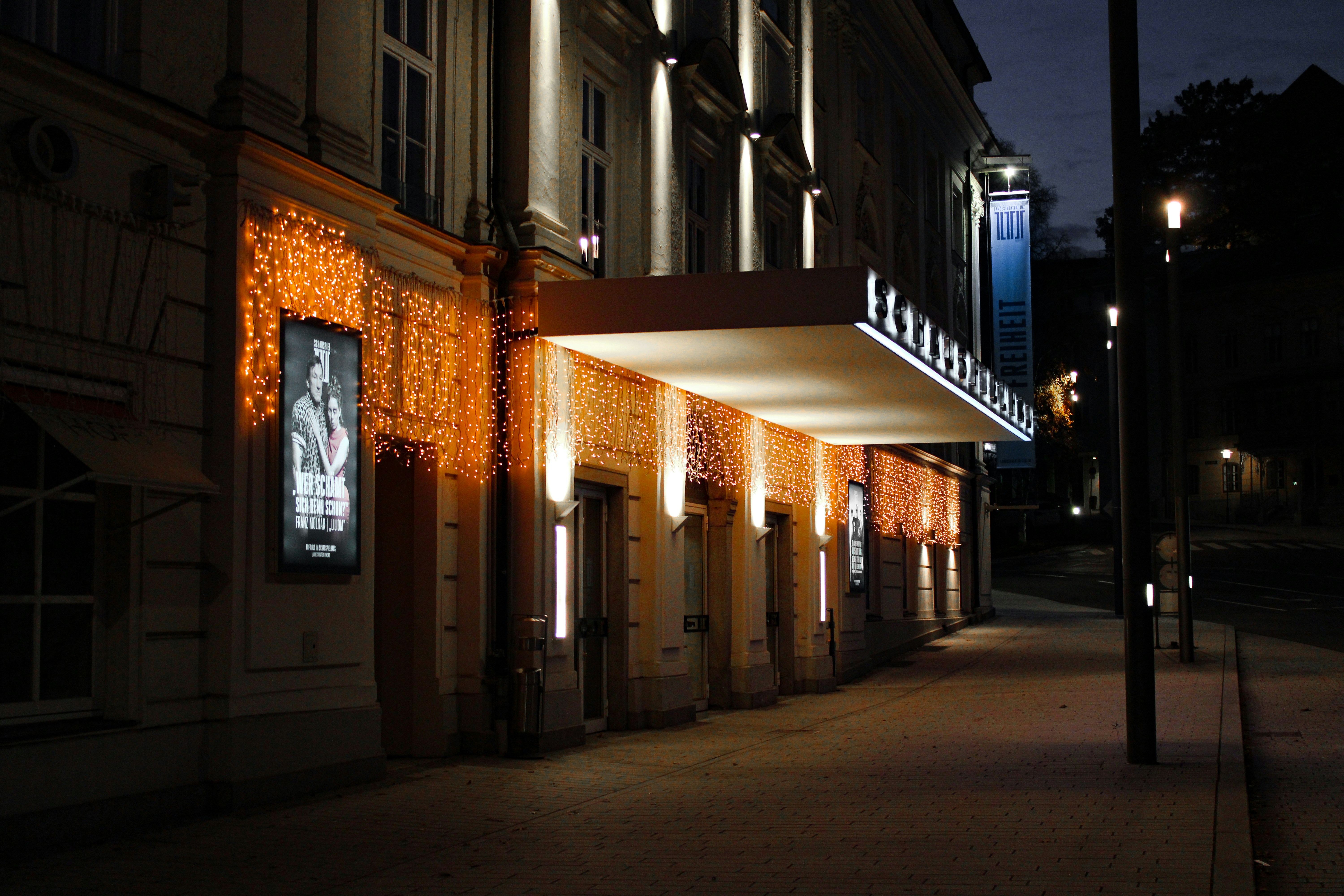 brown and white concrete building during nighttime