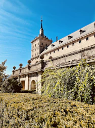 brown concrete building under blue sky during daytime