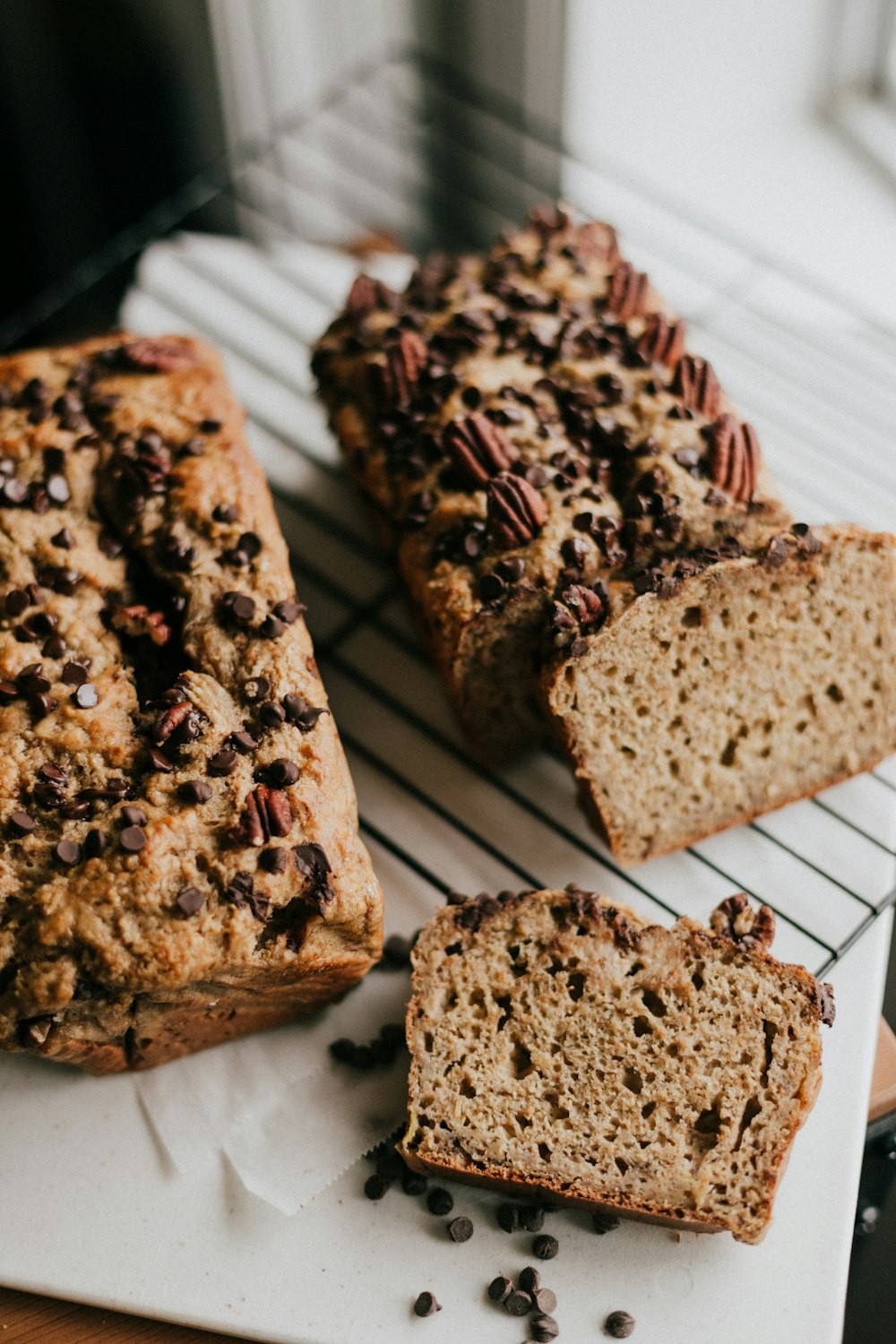 brown bread on white and blue checkered textile