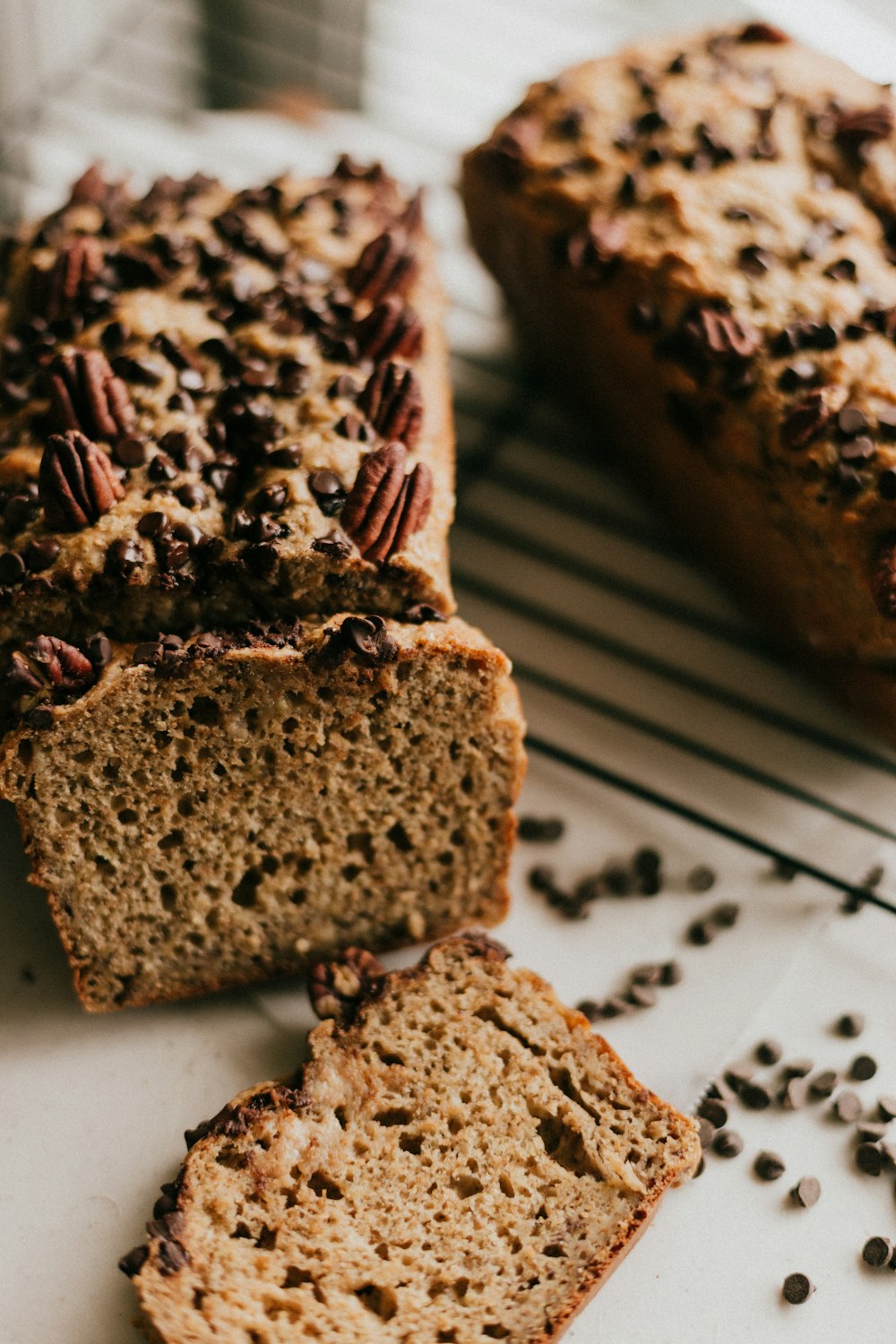 brown bread with chocolate syrup on white paper