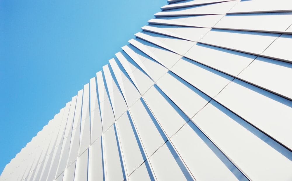 white concrete building under blue sky during daytime