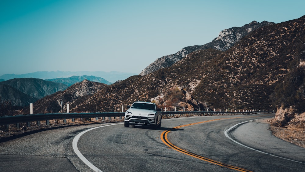 white car on road during daytime