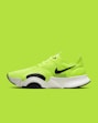 green and black nike athletic shoe
