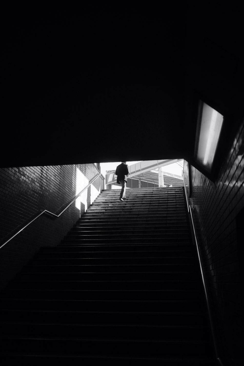person walking on the stairs