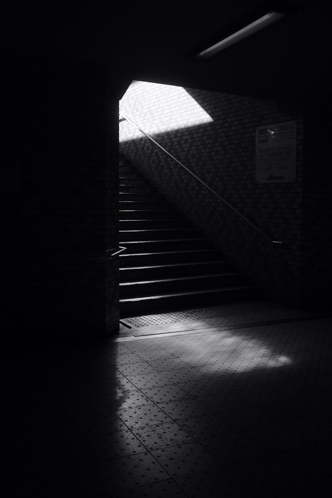 grayscale photo of concrete stairs