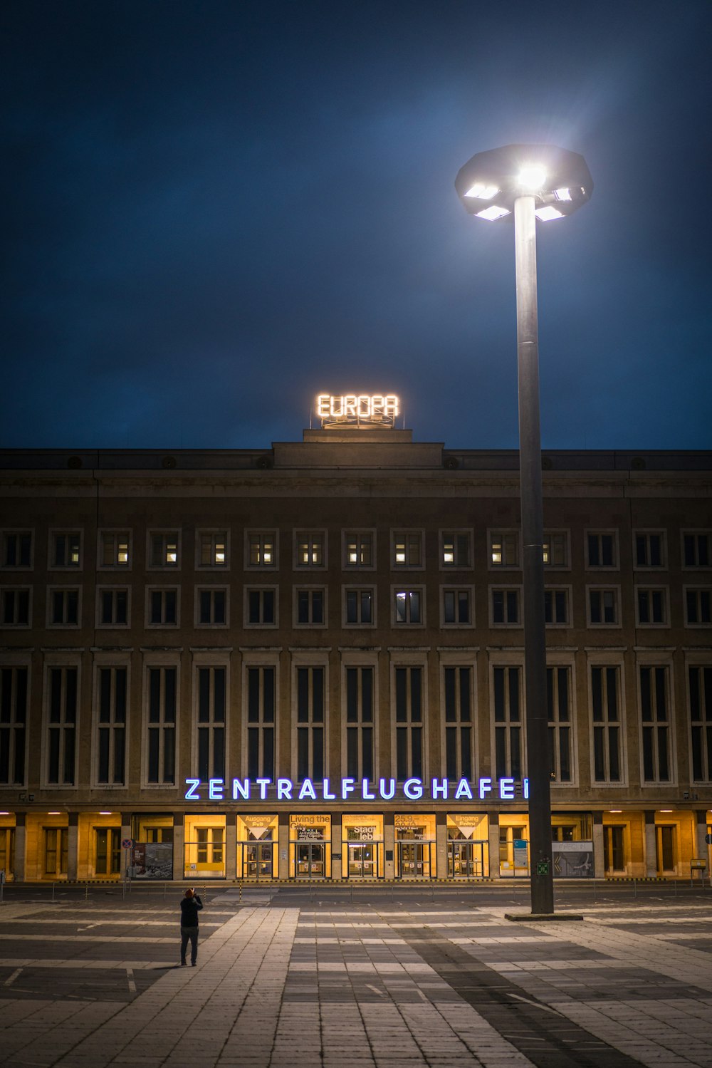 brown concrete building during night time