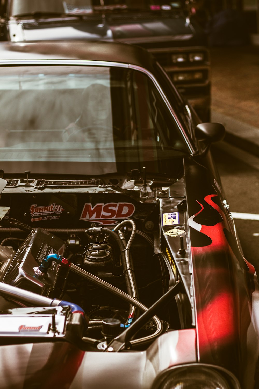 black and red car steering wheel