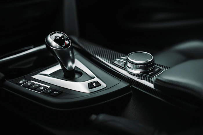 Automatic transmission gear selector in a vehicle center console