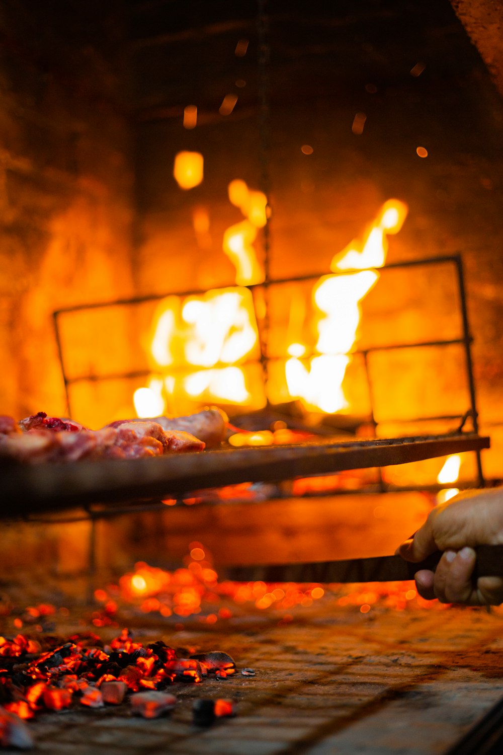 person holding stick with fire