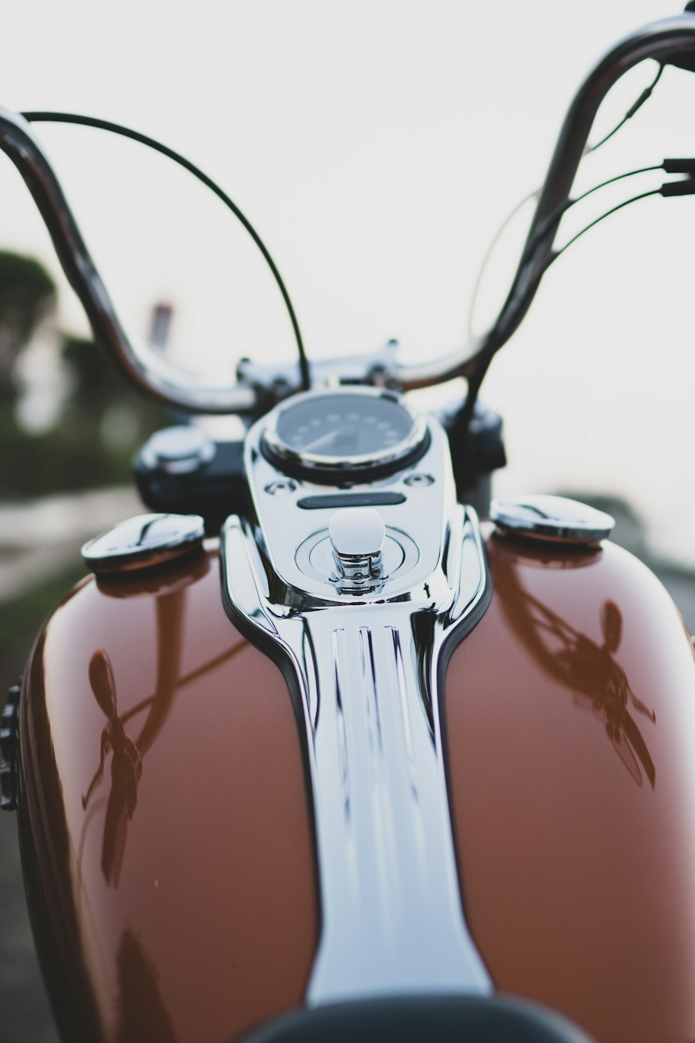 red and silver motorcycle in tilt shift lens