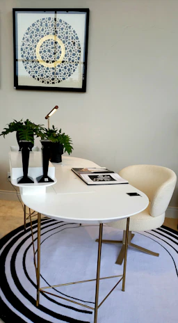 An elegant workspace arranged according to vastu principles with subtle geometric patterns.