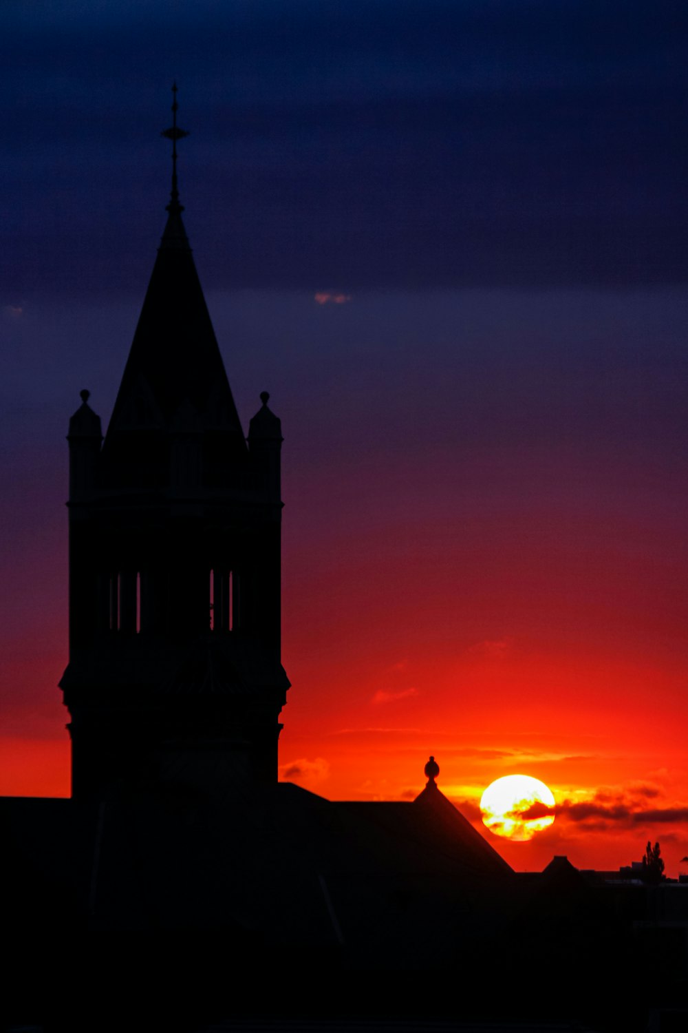 silhouette of building during sunset