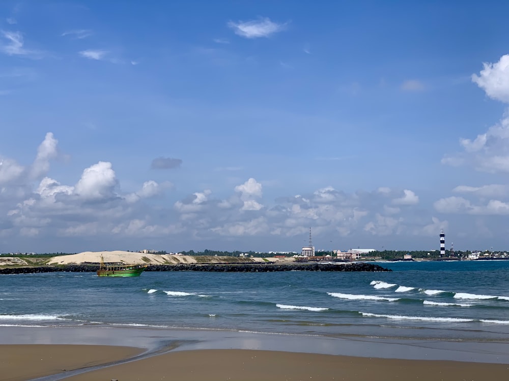 white and blue sky over beach