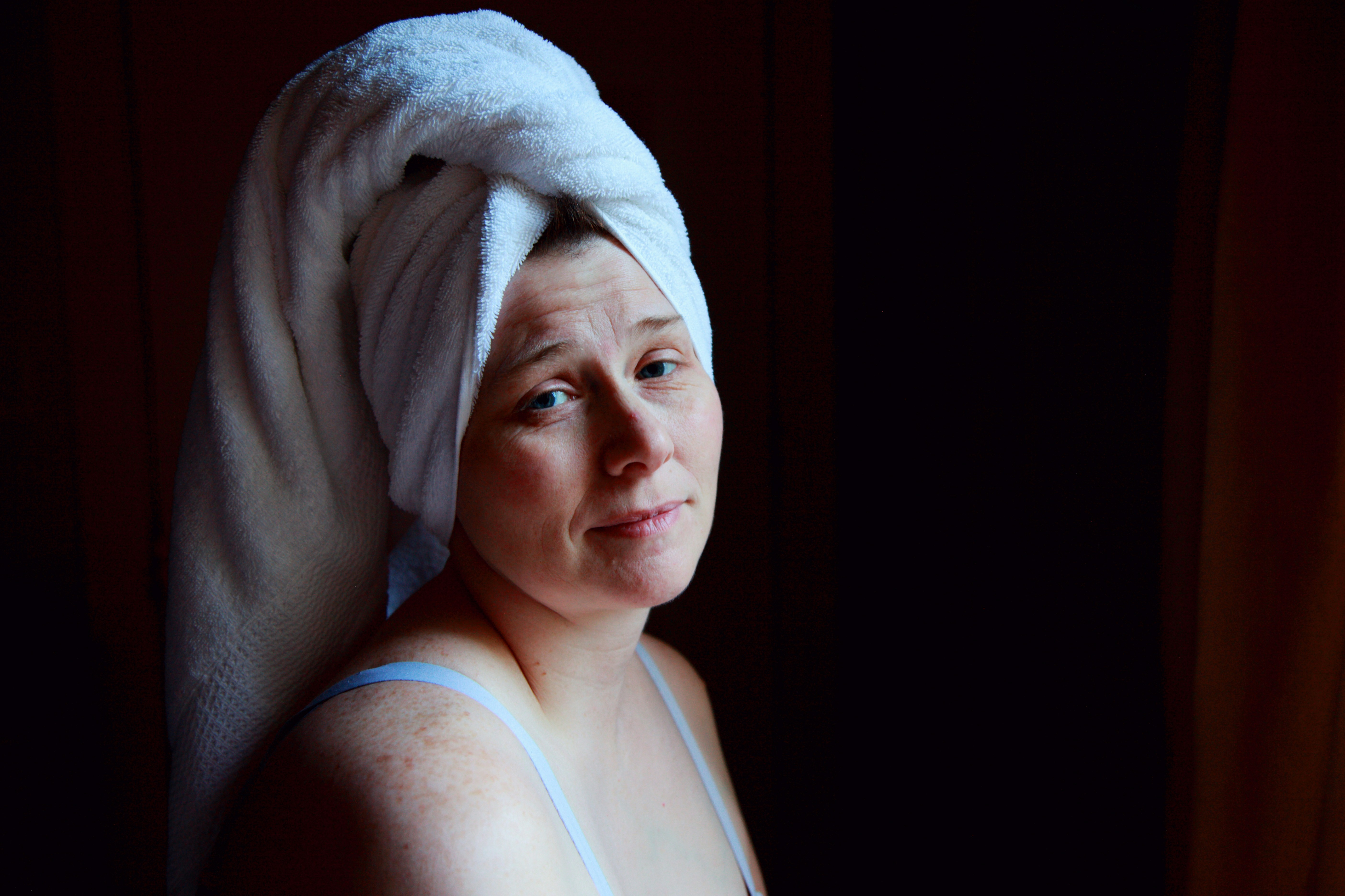 Shane drying their hair after showering.