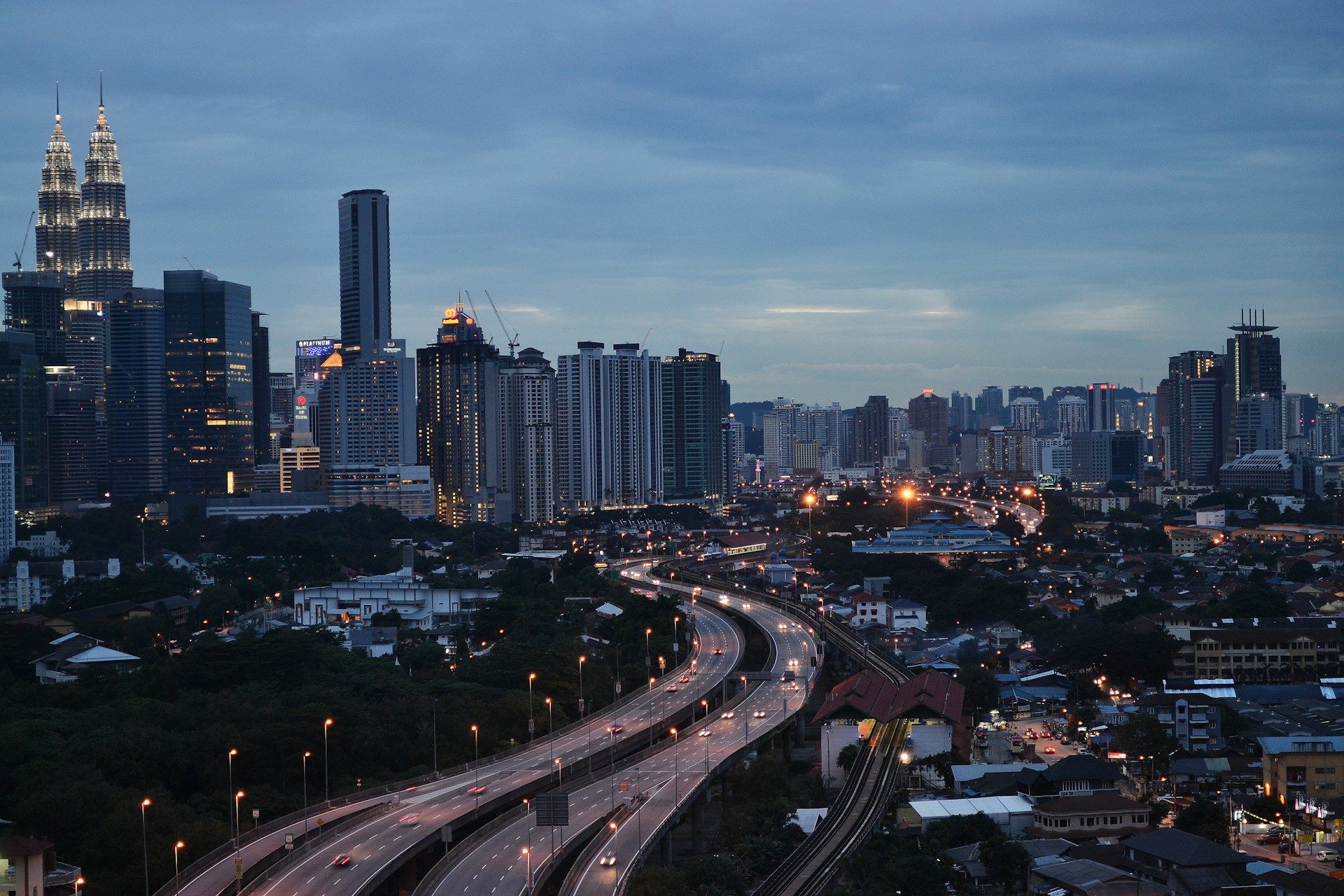 city buildings and roads during night time