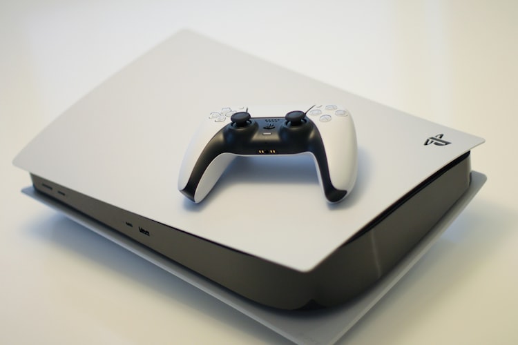 A sleek PlayStation 5 console standing vertically, representing the future of the platform.