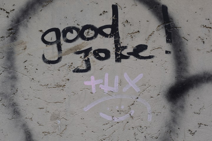 Graffiti that reads "Good Joke" in black text and "thx :)" in pink text