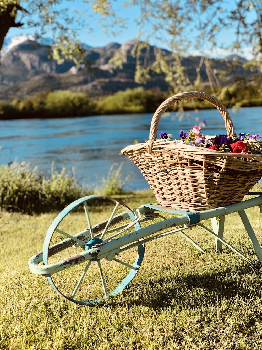 brown woven basket on white bicycle