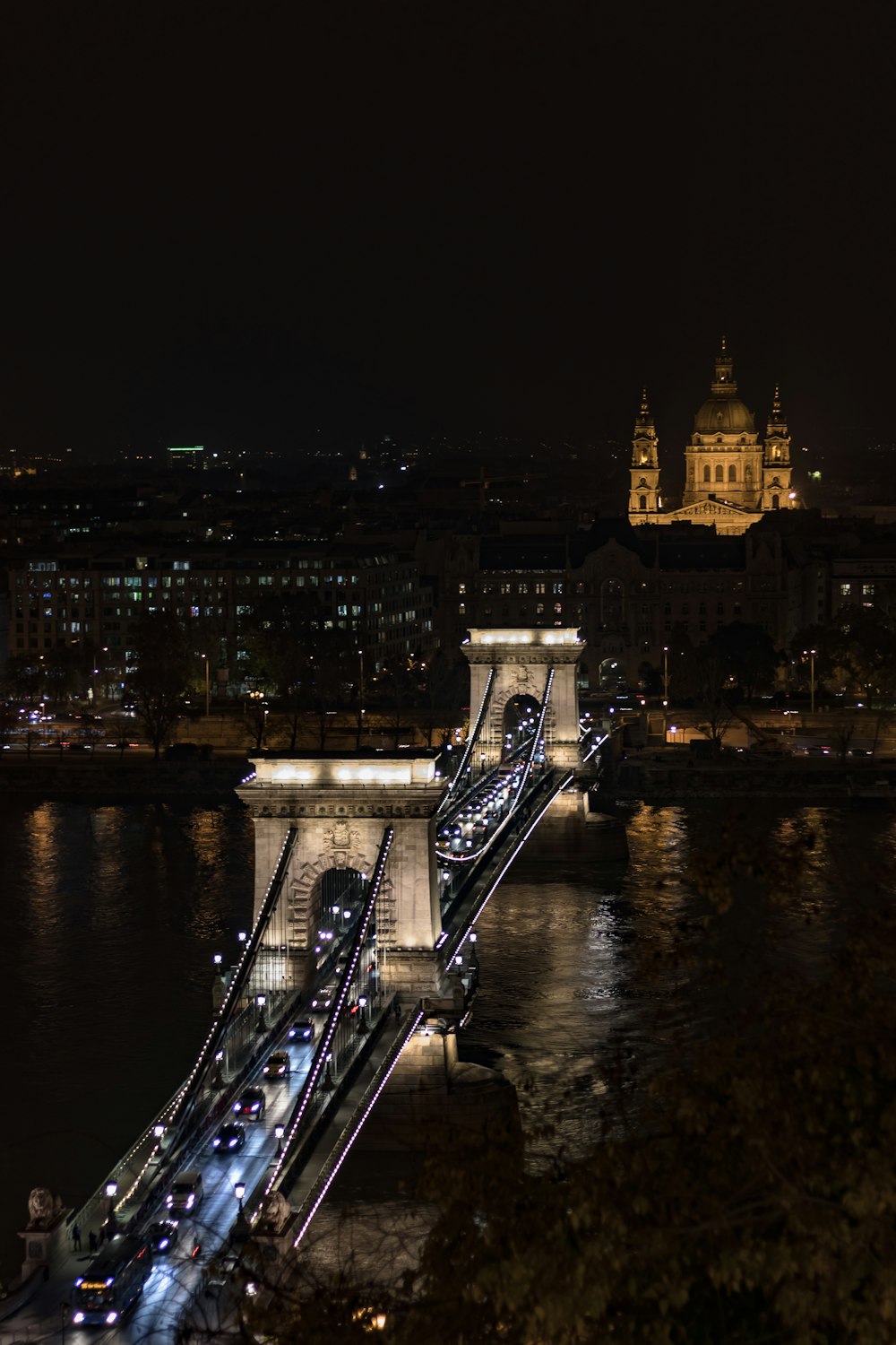 bridge over river during night time