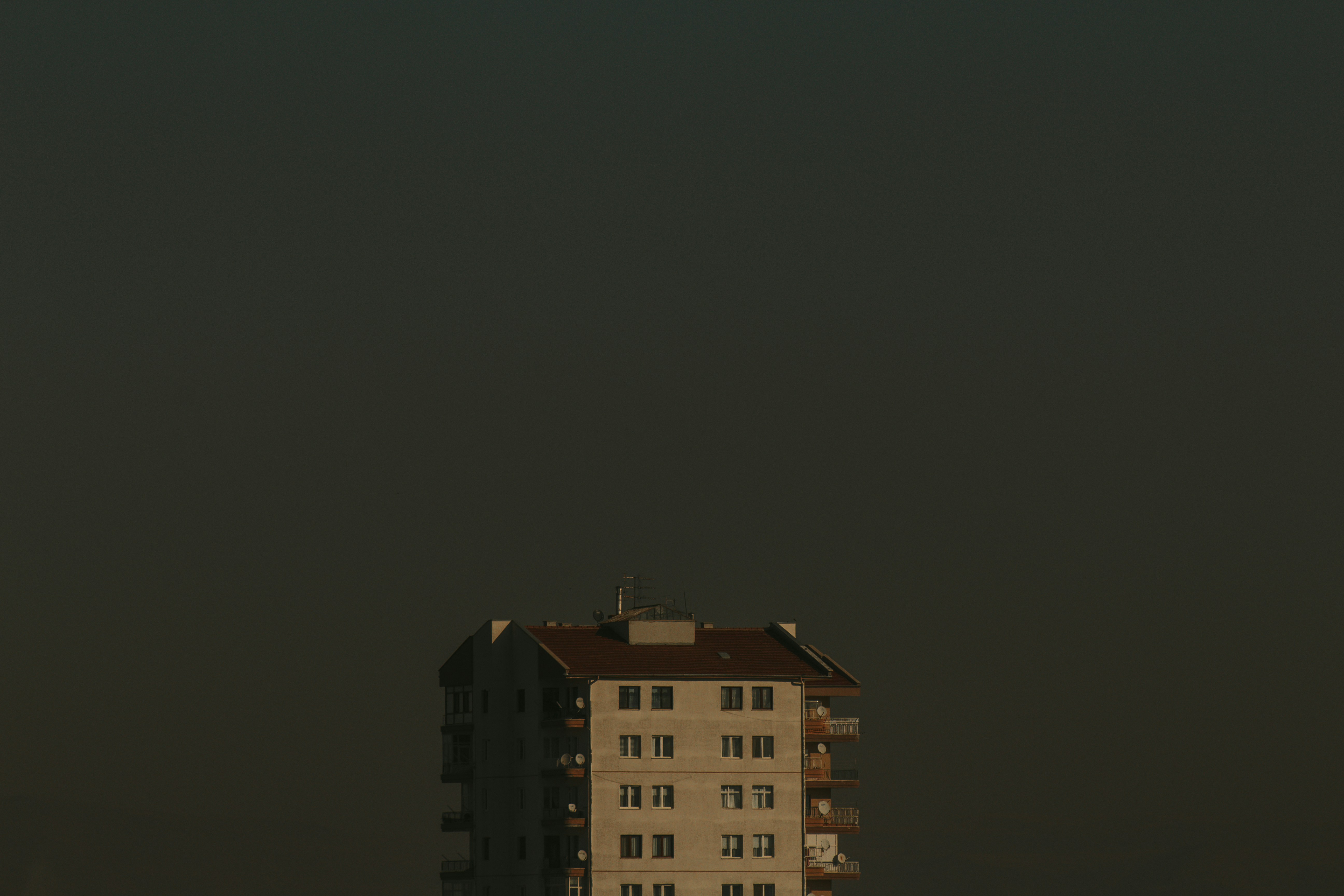 brown concrete building during night time