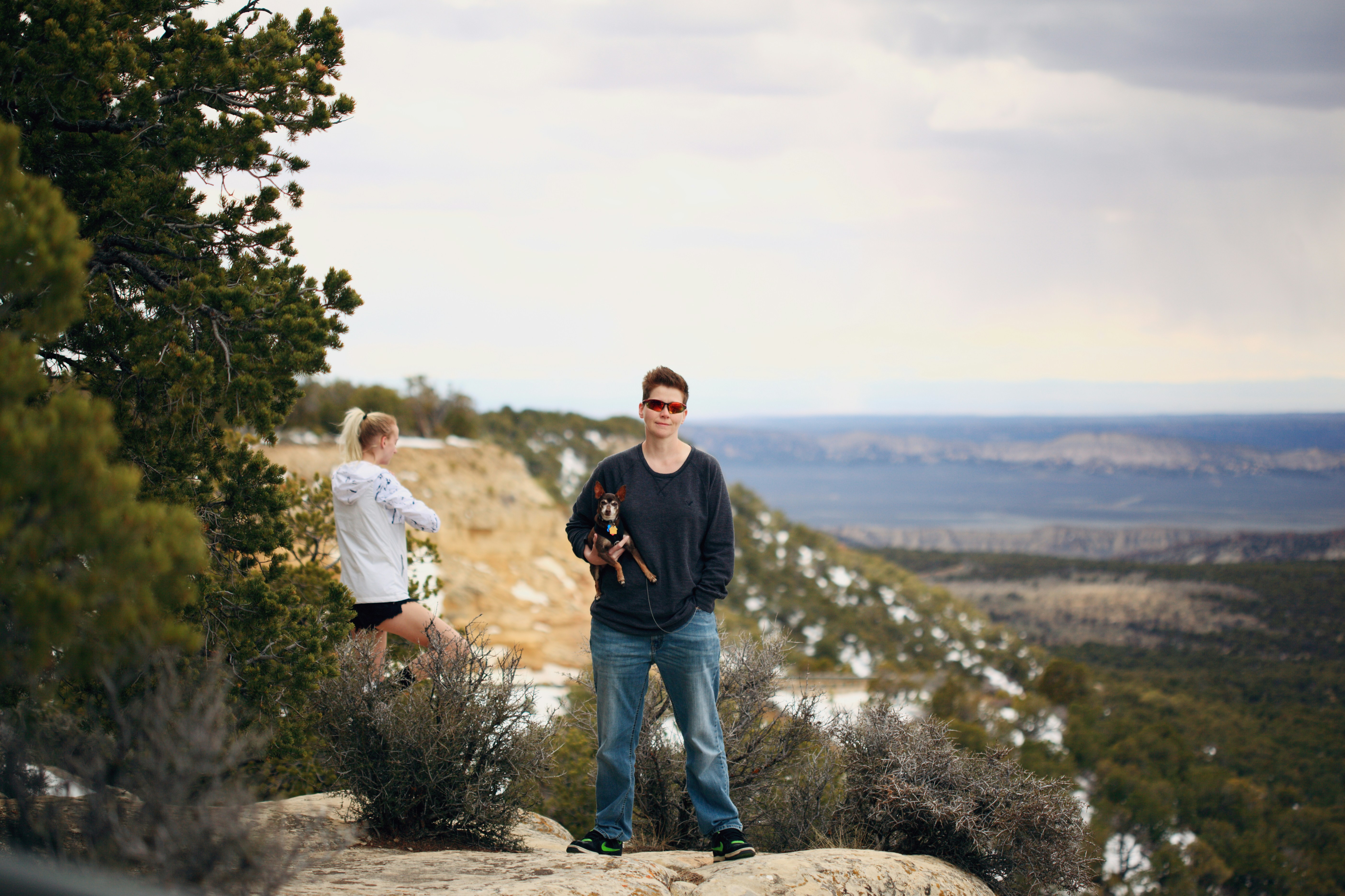 man in black crew neck t-shirt standing beside woman in white t-shirt during daytime