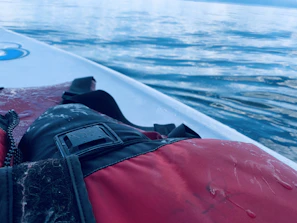 Stacks of sleek, durable life jackets designed specifically for intense water sports.