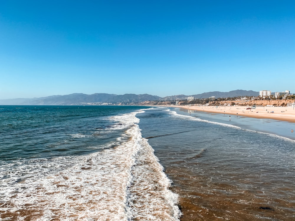 blue sea under blue sky during daytime