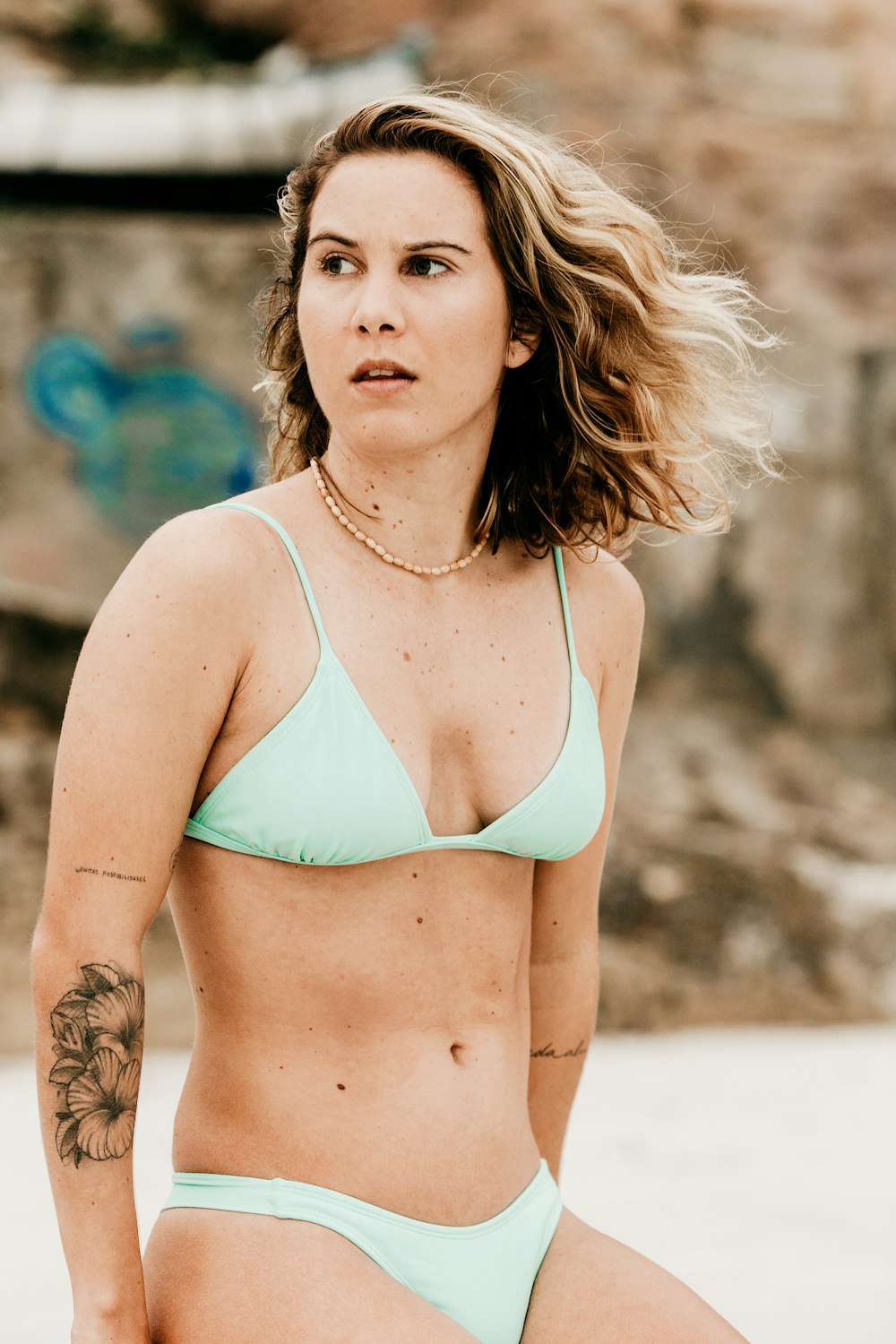 woman in green bikini top