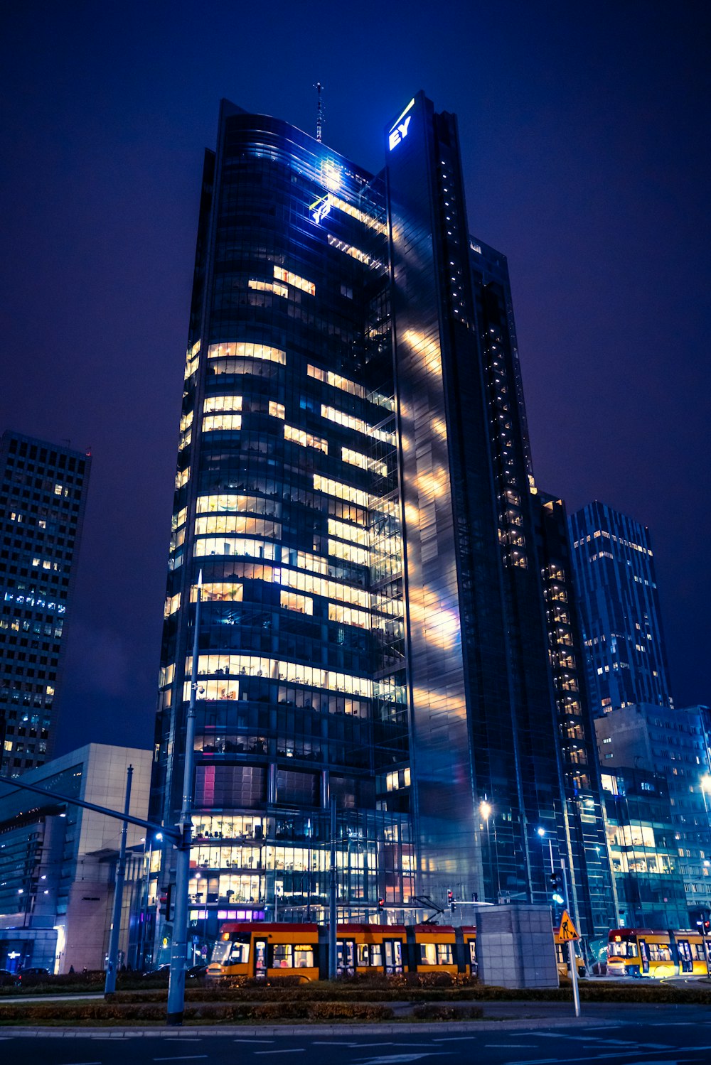 black and white high rise building during night time