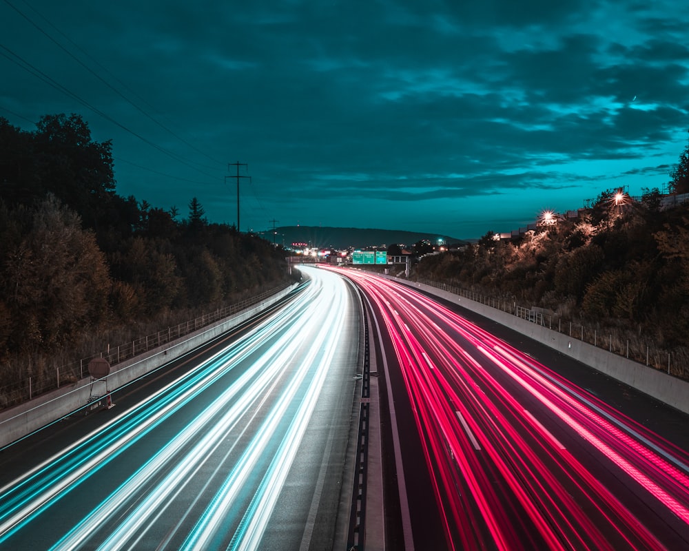 time lapse photography of cars on road during night time