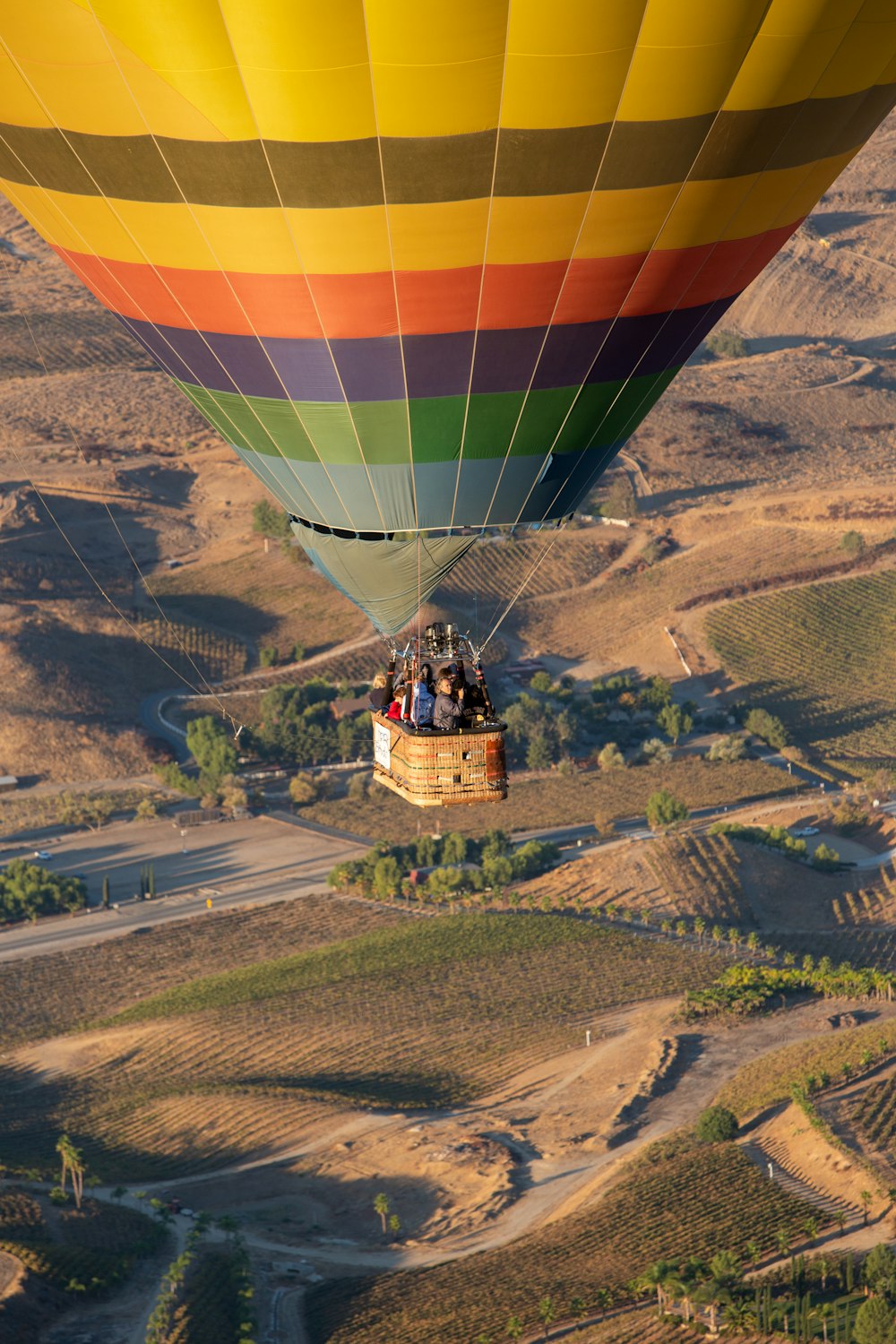 yellow orange and blue hot air balloon