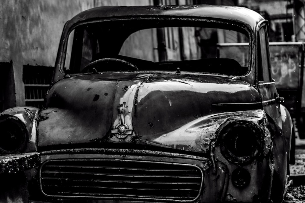 grayscale photo of vintage car